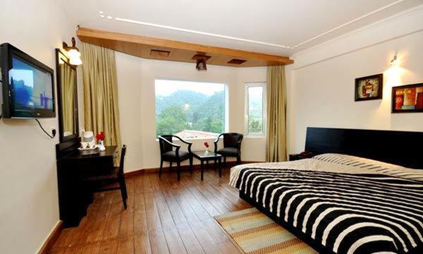 Hotel Suman Paradise Nainital Quarto foto